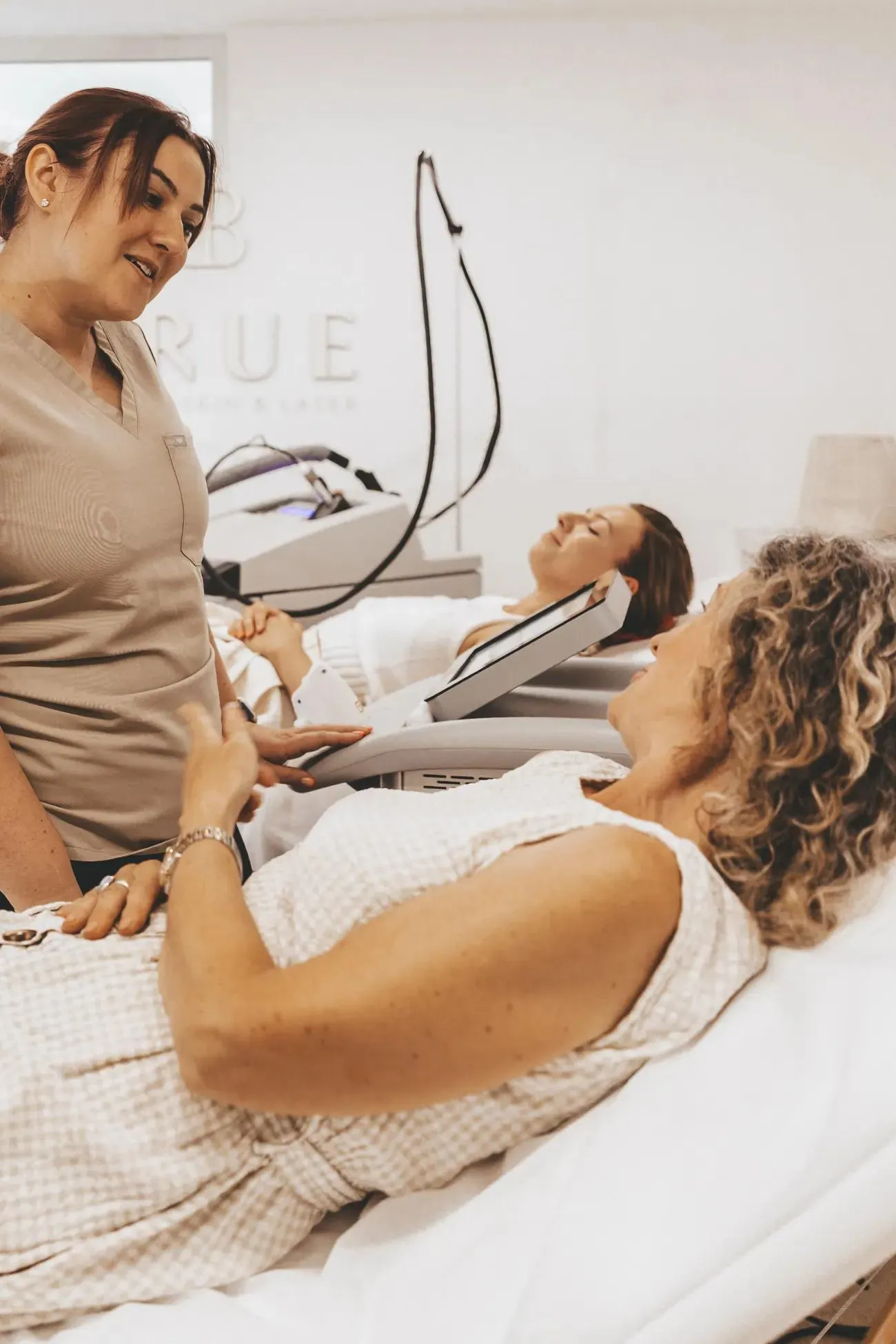 A student practising laser treatment on a model during training